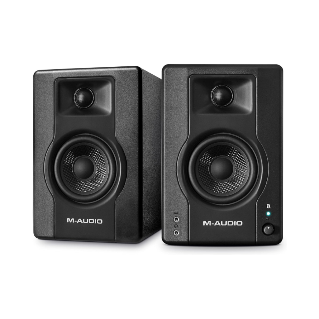 Close-up of the M-Audio BX4 BT Bluetooth studio monitor speaker with a sleek design”